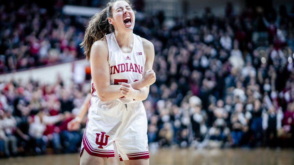 Senior forward MacKenzie Holmes celebrates an and one Jan. 26, 2023 at Simon Skjodt Assembly Hall in Bloomington, Indiana. Holmes was named as one of 10 finalists to the Lisa Leslie Award on Friday.