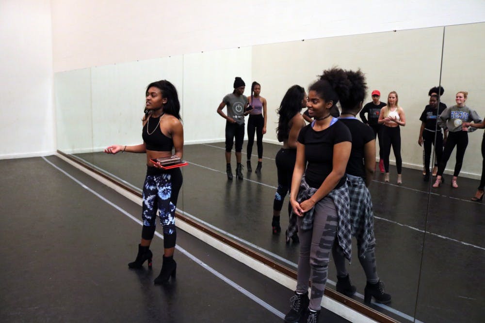 Alexis Deverly, teacher of Heels Dance Hip Hop dancing class at IU, talks in front of the students about the class schedule. &nbsp;IU’s Hip Hop ConnXion will perform “Set It Off” at 6:30 p.m. Sunday in the Buskirk-Chumley Theater.&nbsp;