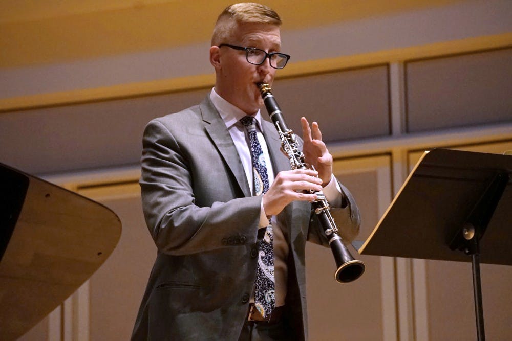 <p>Graduate student Erik Franklin performs several clarinet pieces accompanied by pianist Hui-Chuan Chen for his graduate recital Jan. 8 in Auer Hall. Franklin performed pieces such as Sonata in E-Flat Major, Op. 120 No. 2 by Johannes Brahms and Fantasy by Joan Tower.</p>