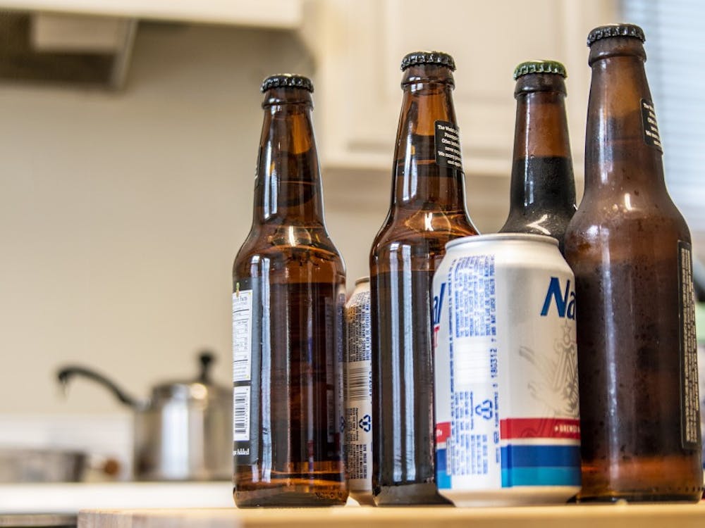 Bottles of cider and beer and cans of beer rest on a kitchen island Sept. 26, 2019. IU’s Indiana Alcohol Research Center will renew the National Institute of Health grant, giving the institute $8.6 million over the coming five years. 