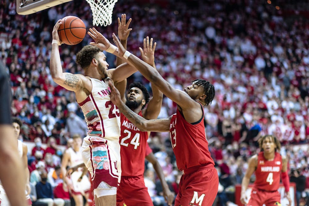 <p>Junior forward Race Thompson passes the ball Feb. 24, 2022, at Simon Skjodt Assembly Hall. Indiana won 74-64 against Maryland.</p>