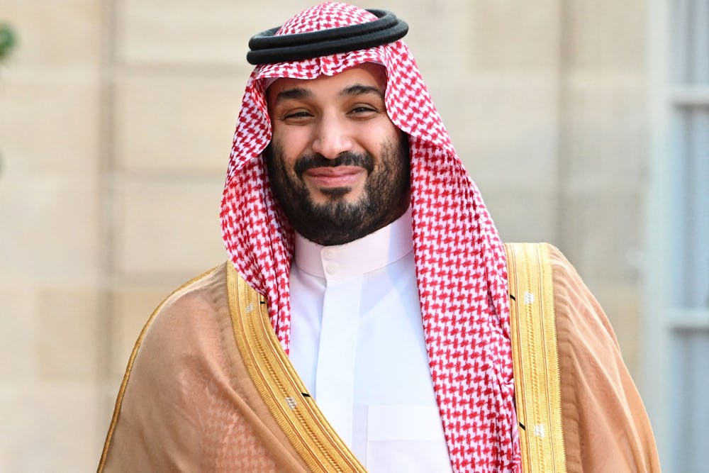 <p>Saudi Crown Prince Mohammed bin Salman smiles as he arrives July 28, 2022, at the Elysee Palace in Paris for a meeting with French President Emmanuel Macron.</p>
