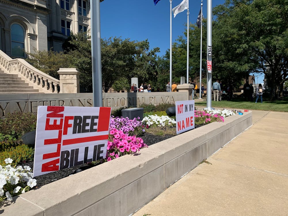 <p>Signs with messages protesting the federal execution of Billie Allen are seen in front of the Vigo County Courthouse on Sept. 20 in Terre Haute, Indiana. Allen was convicted and sentenced to the federal death penalty for a 1997 armed robbery and murder of bank security guard Richard Heflin in St. Louis, Missouri, despite no forensic evidence tying him to the crime.</p>