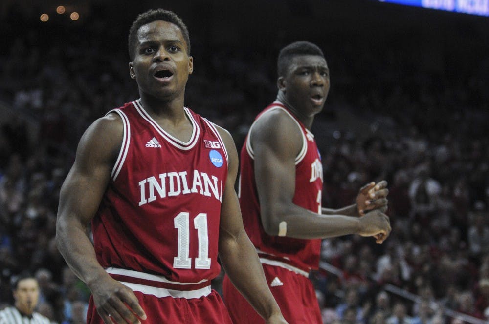 Senior guard Yogi Ferrell and freshman center Thomas Bryant react to a foul called against Indiana during the Hoosier's game against the Tarheels on Saturday at the Wells Fargo Center. Indiana lost 101-86.
