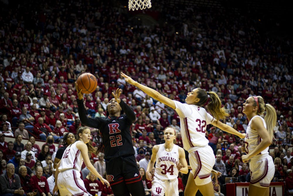 <p>Graduate forward Alyssa Geary extends for a block Jan. 29, 2023, at Simon Skjodt Assembly Hall. The Hoosiers beat Rutgers 91-68.</p>