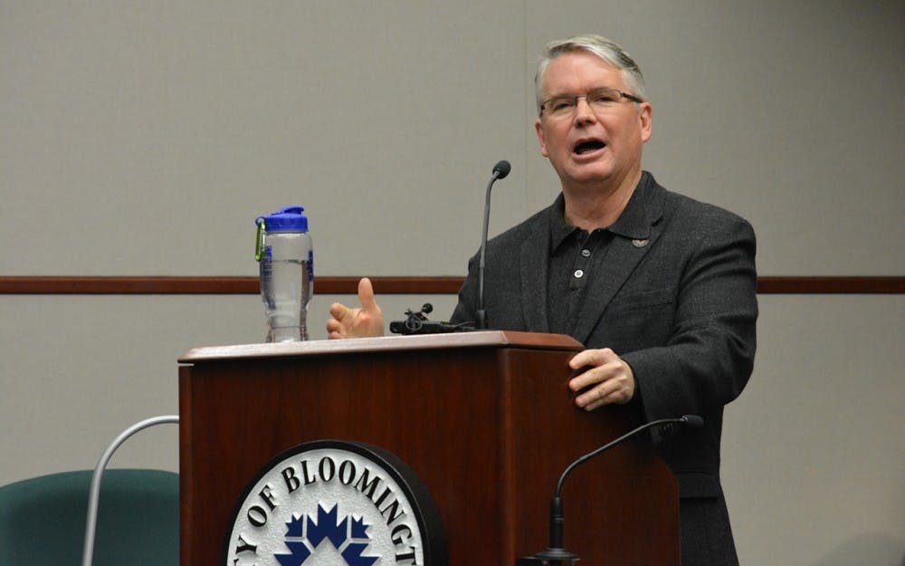 Bloomington Mayor John Hamilton presents his support of the annexation to the City Council at Wednesday night's meeting. Hamilton said the annexation would provide benefits to township and city residents alike.