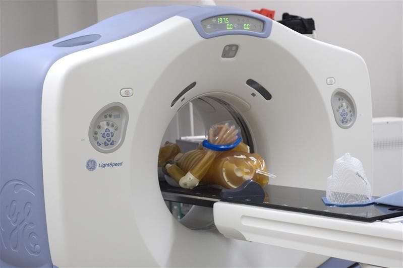 A dummy is loaded into a CT scanner for a practice reading on Friday afternoon at the ProCure Treatment Center on North Walnut Street. The CT scanner is used to measure the size of the tumor to be treated by proton radiation.