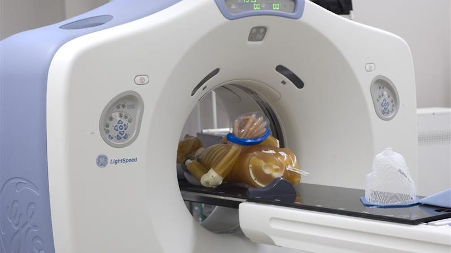 A dummy is loaded into a CT scanner for a practice reading on Friday afternoon at the ProCure Treatment Center on North Walnut Street. The CT scanner is used to measure the size of the tumor to be treated by proton radiation.