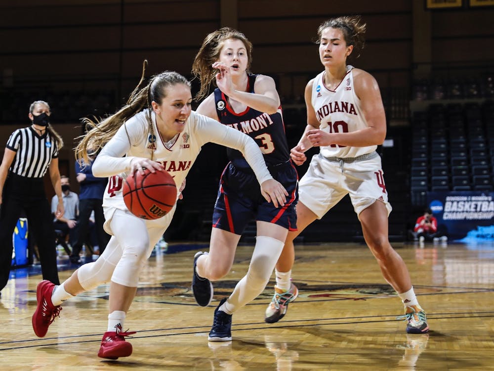 Then-redshirt junior Nicole Cardaño-Hillary dribbles the ball against Belmont University on March 24. Cardaño-Hillary transferred to IU during the COVID-19 pandemic.