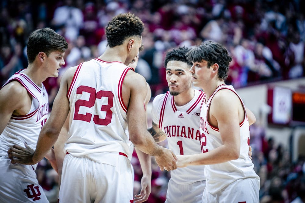 <p>Freshman guard Jalen Hood-Schifino is seen in a team huddle Jan. 28, 2023, at Simon Skjodt Assembly Hall in Bloomington. The Hoosiers beat Ohio State 86-70.</p>
