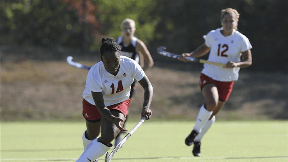 Sophomore forward Shareyna Chang heads toward the goal during the Hoosier's game against the Cardinals Tuesday at the IU Field Hockey Field. 