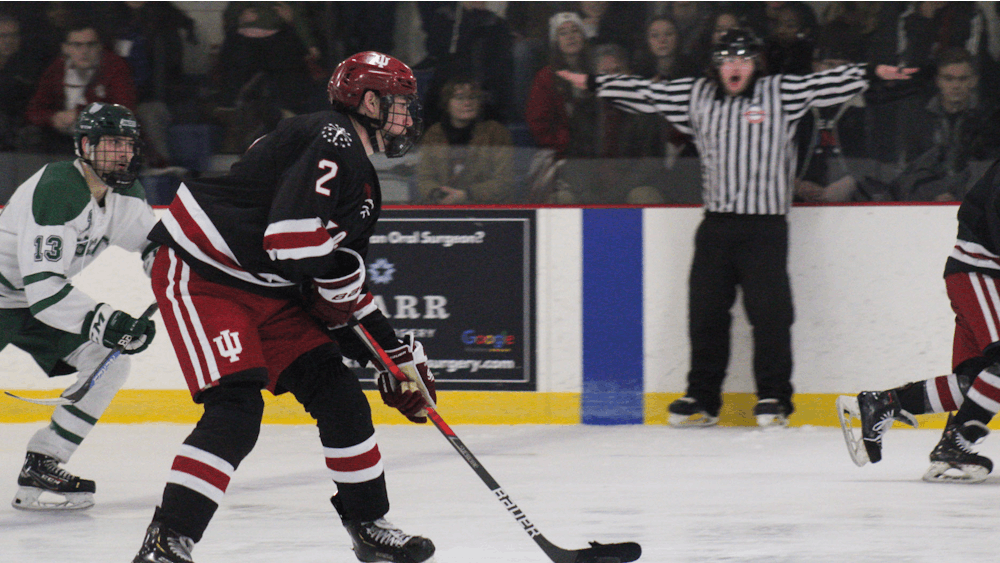 Then-junior defenseman Matthew McKay rushes forward with the puck on Jan. 14, 2023, during a game against Ohio State at Frank Southern Ice Arena. Indiana is 3-1 to start its 2023-24 campaign.