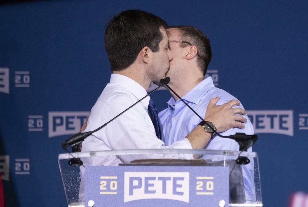 <p>Pete Buttigieg, mayor of South Bend, Indiana, kisses his husband, Chasten, on April 14, 2019, in South Bend, Indiana. </p>