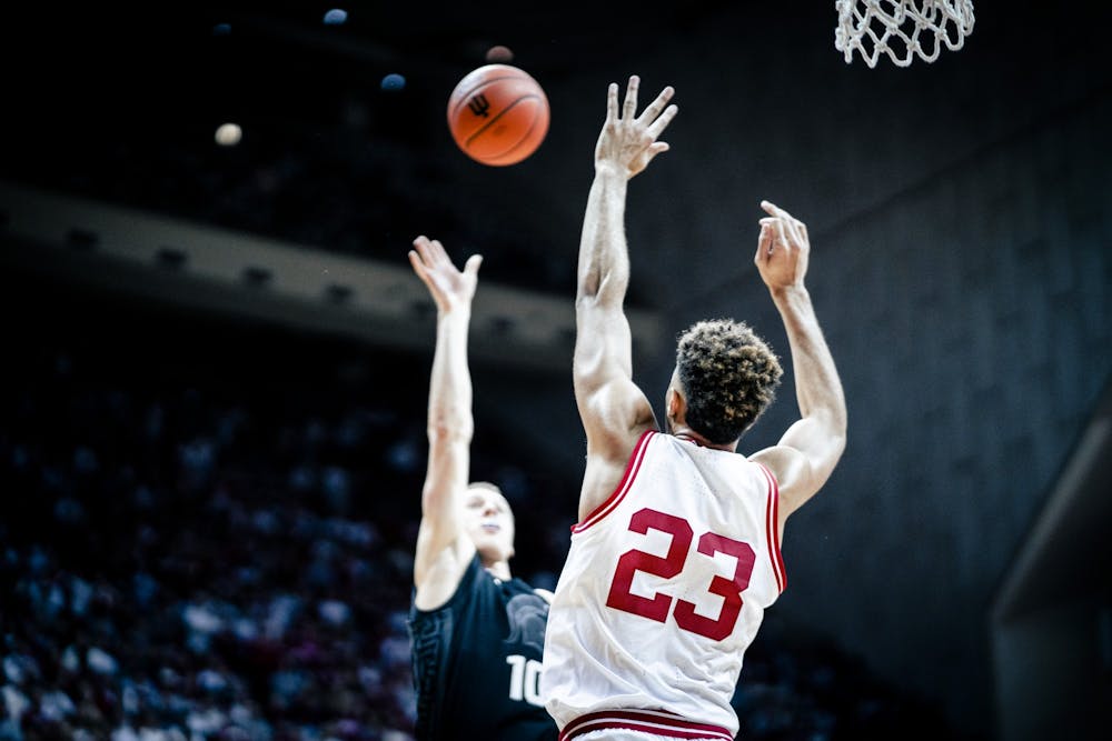 <p>Senior forward Trayce Jackson-Davis attempts to block a shot Jan. 22, 2023, at Simon Skjodt Assembly Hall in Bloomington. The Hoosiers beat Michigan State 69-82.</p>