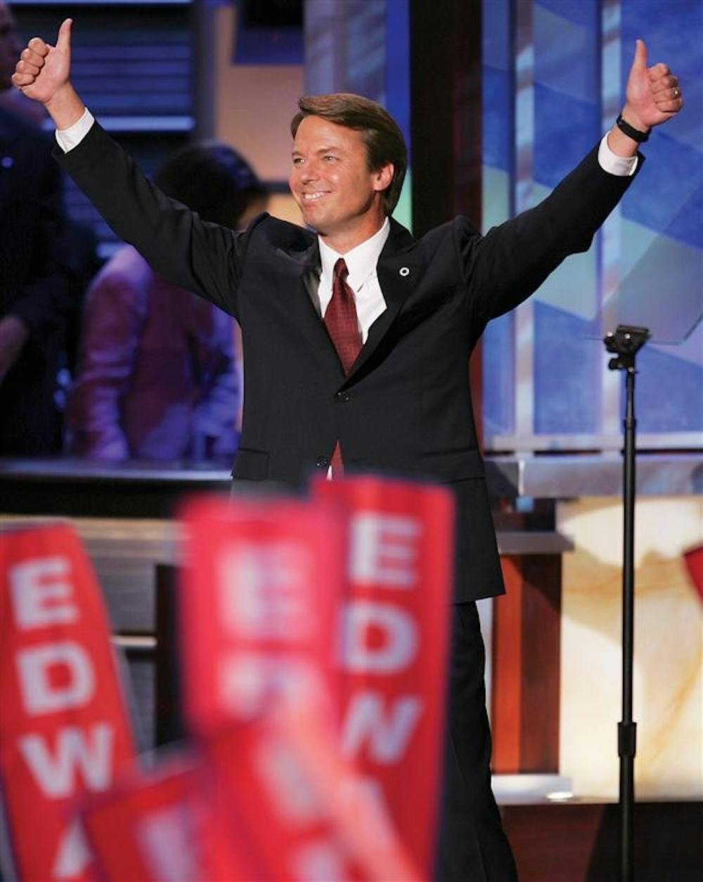 Vice presidential candidate John Edwards reacts to the applause of delegates before speaking at the Democratic National Convention on Wednesday, July 28, 2004, in Boston. 