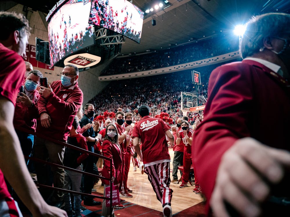 The Indiana men’s basketball team runs onto the court ahead of its game against No. 4 Purdue on Jan. 20, 2022. Indiana had a nine-game losing streak against Purdue going into Thursday’s game.