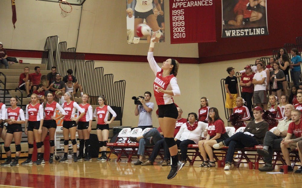 Samantha Fogg, Indiana University sophomore, serves the ball during volleyball competition against the Northwestern on Wednesday.