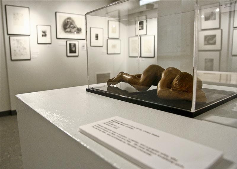 Pieces from the exhibit "Pre-Revolutionary Queer: Gay Art and Culture Before Stonewall" on display Monday afternoon at the Kinsey Institute. The exhibit will be on display through Feb. 14.