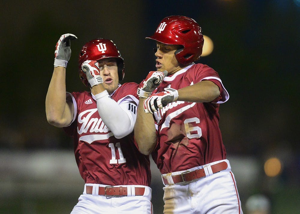 Senior Will Nolden celebrates with freshman Isaiah Pasteur after the Hoosiers beat Notre Dame on Tuesday at Victory Field in Indianapolis. Pasteur's hit allowed Nolden to score from second base, resulting in a walk-off.