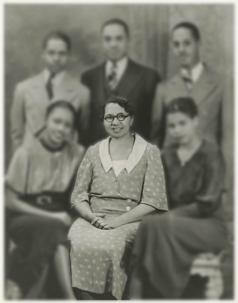 Carrie Parker, bottom center, poses with her children. Parker was the first African-American woman to become a student at Indiana University. She graduated from Clinton High School, Clinton, Indiana in 1897 and matriculated at IU on January 4, 1898 where she attended through the fall of 1898.