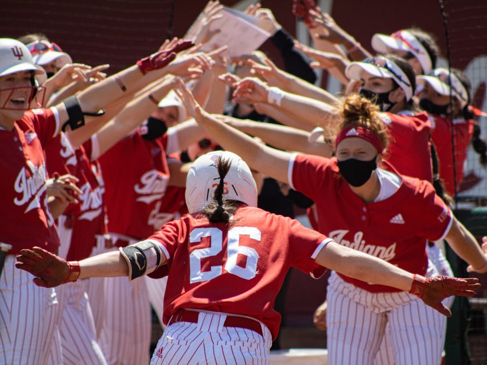 Then-senior infielder Grayson Radcliffe celebrates with her teammates after hitting a home run against Michigan State on May 1, 2021, at Andy Mohr Field. Indiana went 3-2 over the weekend.