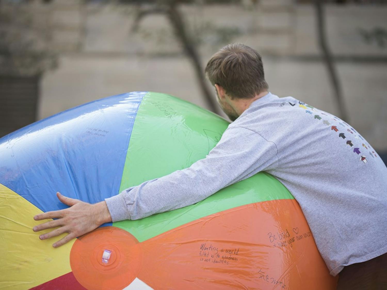 GALLERY: Young Americans for Liberty asks students to sign a giant beach ball