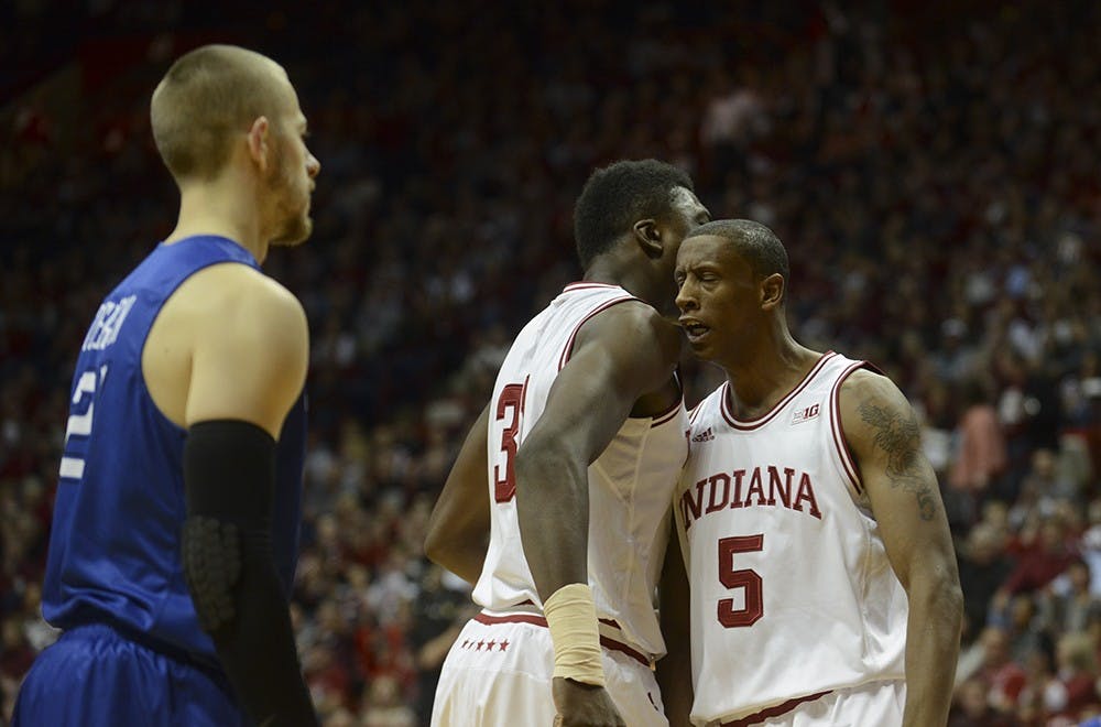 Freshman center Thomas Bryant and junior forward Troy Williams celebrate during the game against Creighton on Thursday at Assembly Hall.