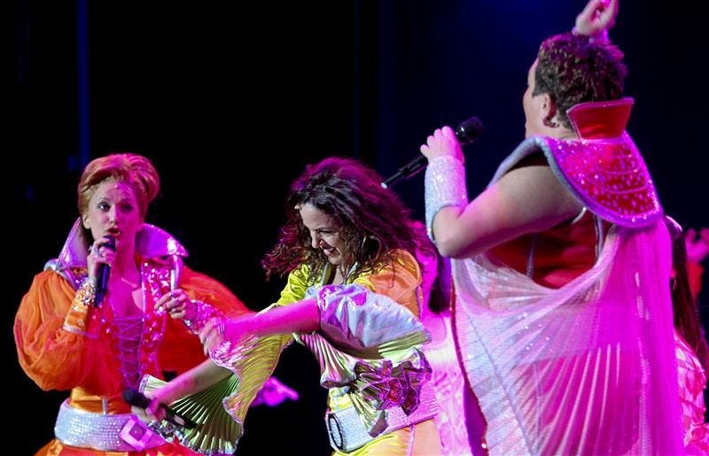 Actresses Rachel Tyler, Michelle Dawson and Kittra Wynn Coomer perform "Dancing Queen" during the encore of "Mamma Mia!" Friday evening at the IU Auditorium. "Mamma Mia!" played five shows at the Auditorium this weekend. 

