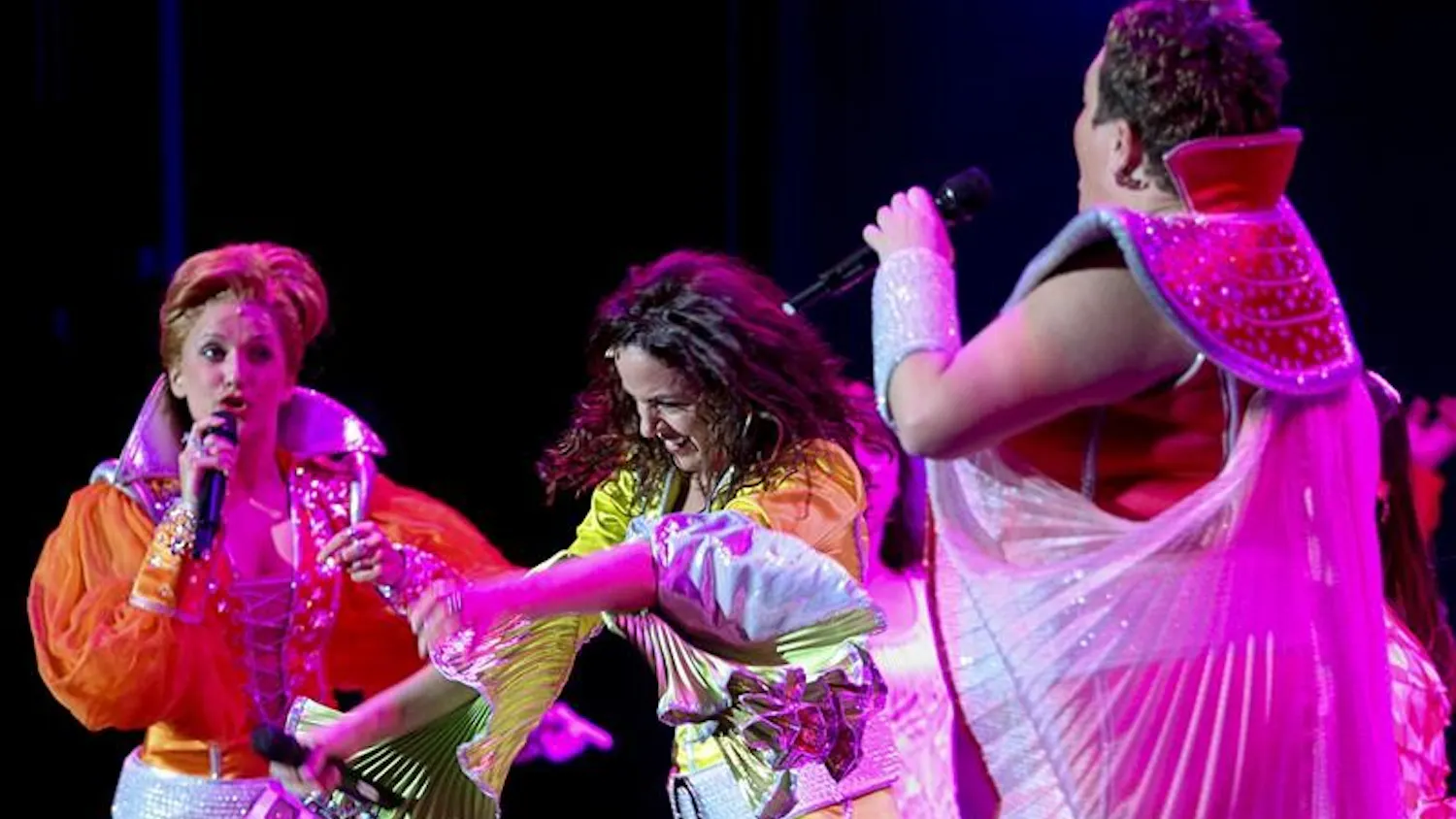 Actresses Rachel Tyler, Michelle Dawson and Kittra Wynn Coomer perform "Dancing Queen" during the encore of "Mamma Mia!" Friday evening at the IU Auditorium. "Mamma Mia!" played five shows at the Auditorium this weekend.