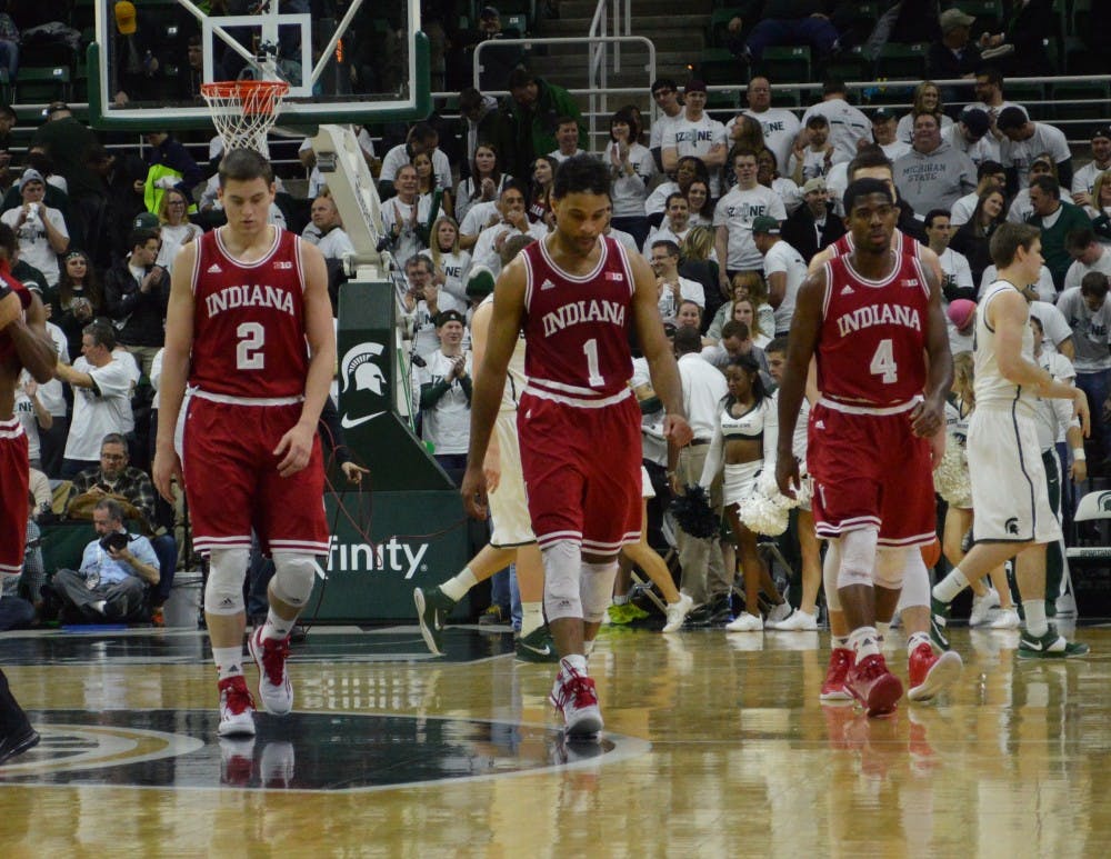 The IU basketball team walk off the court after losing to Michigan State 50 to 70 Monday at Breslin Student Events Center.