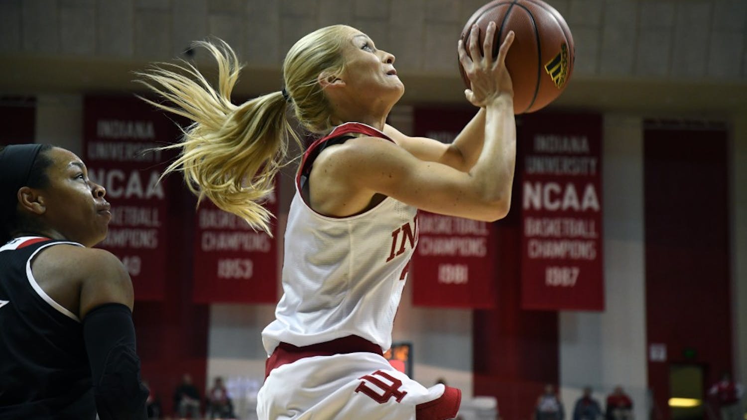 Senior guard Tyra Buss attempts a layup against Louisville on Nov. 30 in Simon Skjodt Assembly Hall. Buss and the Hoosiers get set to play No. 10 Ohio State at home on Saturday.&nbsp;