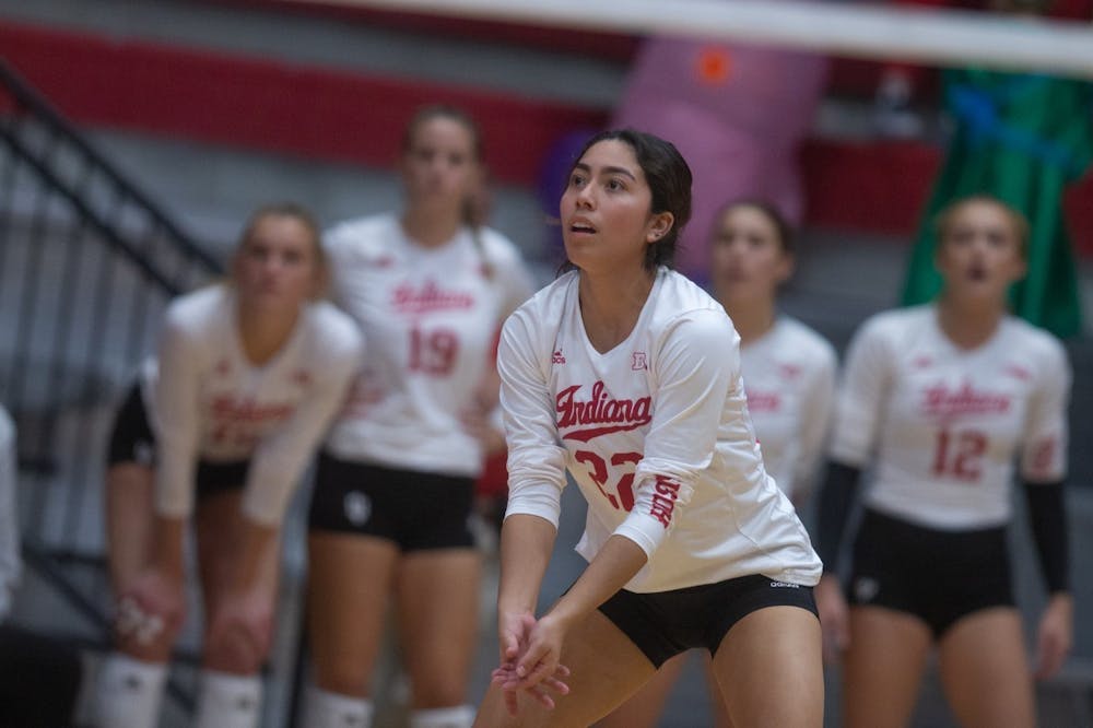 <p>Then-junior defensive specialist Isa Lopez prepares to bump the ball during a volleyball game against Rutgers on Oct. 28, 2022. Indiana went 0-3 in the Long Beach Invitational.</p>