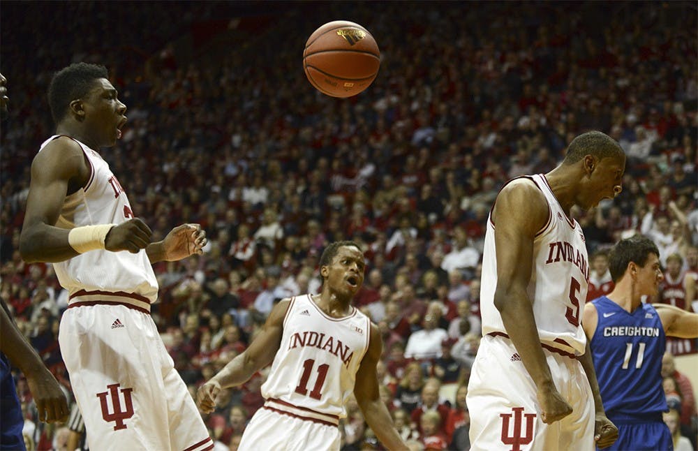 Junior forward Troy Williams celebrates after scoring and drawing a foul during the game against Creighton on Nov. 19 at Assembly Hall.
