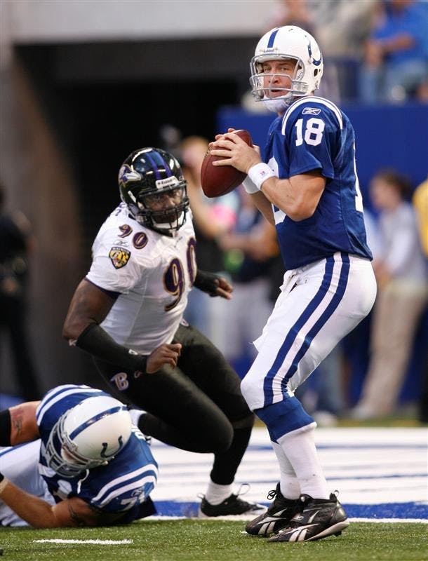 Indianapolis Colts quarterback Peyton Manning gets set to throw in the second half against the Baltimore Ravens in an NFL football game on Sunday in Indianapolis. Indianapolis won 31-3.