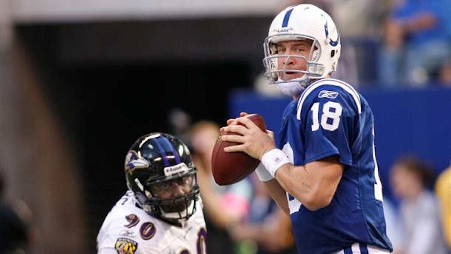 Indianapolis Colts quarterback Peyton Manning gets set to throw in the second half against the Baltimore Ravens in an NFL football game on Sunday in Indianapolis. Indianapolis won 31-3.