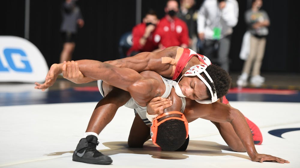Sophomore DJ Washington wrestles with Illinois sophomore DJ Shannon at the Big Ten Wrestling Championships on March 6, 2021, in State College, Pennsylvania. IU will face the University of Michigan at 7 p.m. Feb. 11 in Wilkinson Hall. 