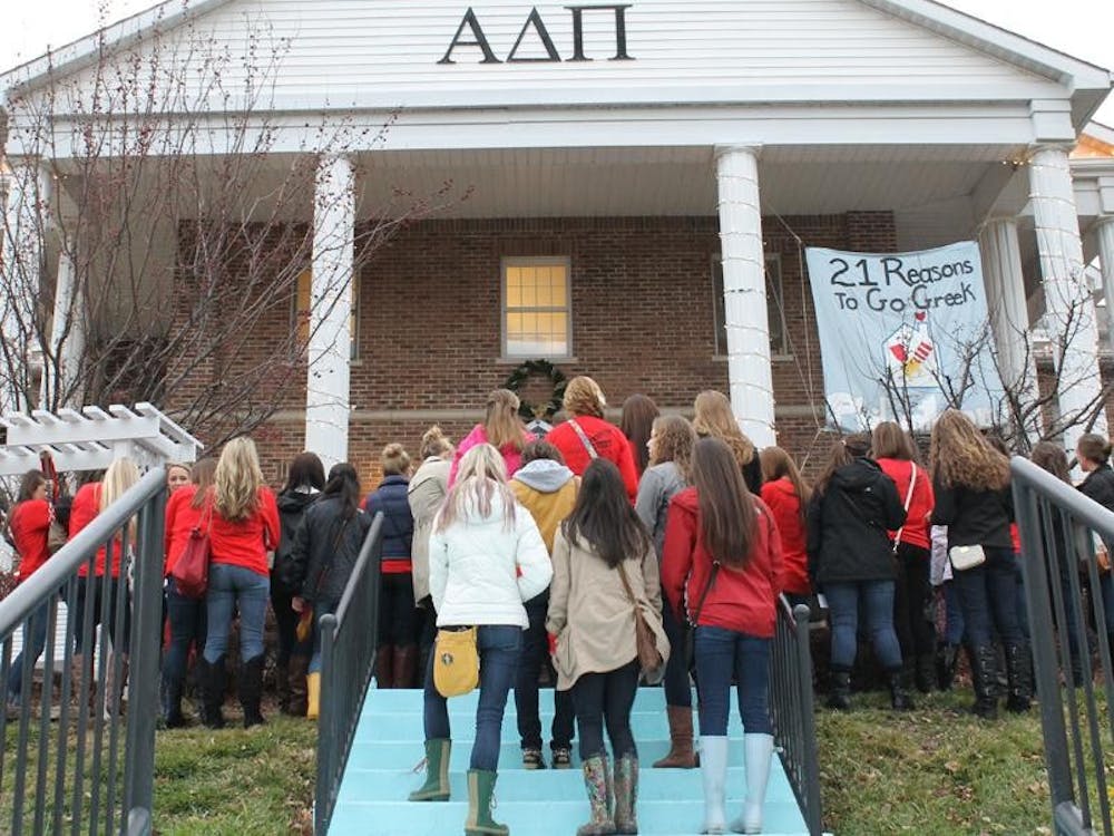 Potential soroity members wait outside Alpha Delta Pi Sunday during the second day of 21 Party, the first official event of women's recruitment. 21 Party allowed women to meet members of each of the 21 Panhellenic Association chapters.