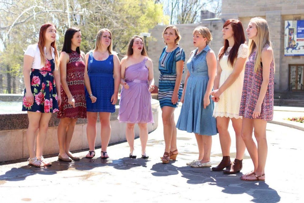 From left: Caitlin Jackson, Anna Hamilton, Maggie Reisdorf, Mary Levering, Hannah Pimley, Sara Klingseisen, Alexi King and Elizabeth Mitchell prepare for the Women in Music Festival. The festival begins today at Rhino's Youth Center. 