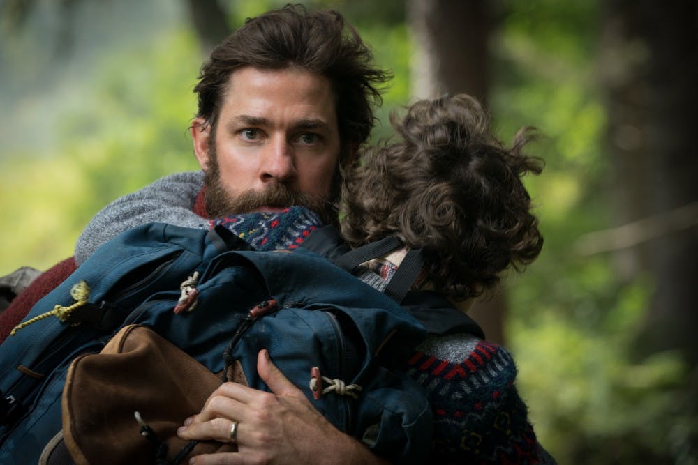 John Krasinski plays Lee Abbott and Noah Jupe plays Marcus Abbott in "A Quiet Place", from Paramount Pictures.