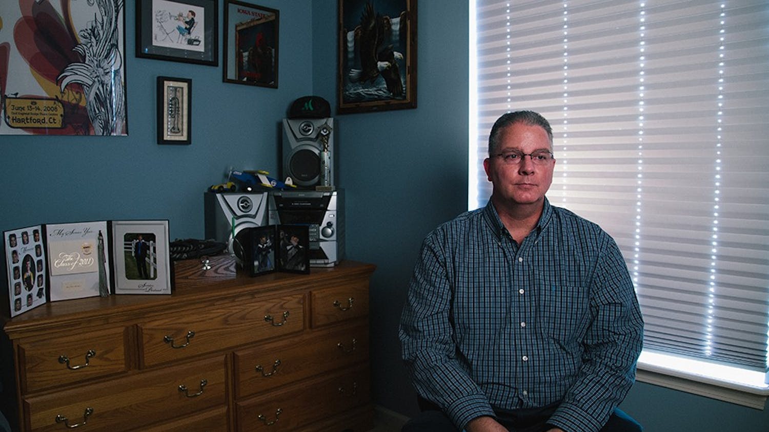 “We just have to accept this reality that I’m not going to see my son again in this life, and I just pray that I see him in the next life.” Bill MacLafferty, father of Brian MacLafferty, in his home in Indianapolis in the room that used to belong to Brian.Brian MacLafferty, 21, a senior majoring in neuroscience, shot himself in his apartment on Indiana Street in September 2014. 