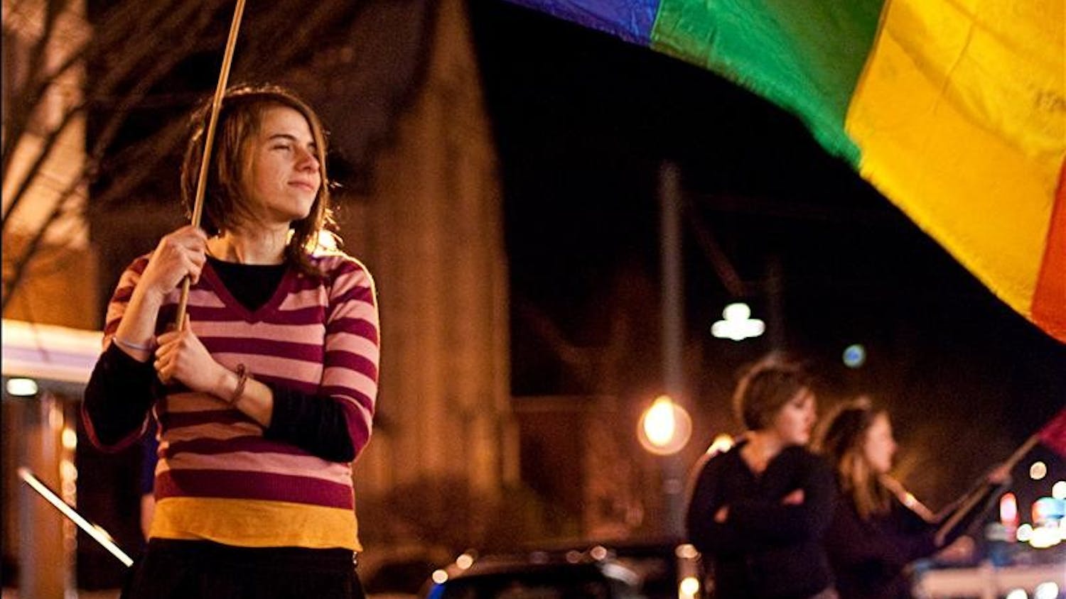 A member of the Bleeding Heartland Rollergirls outside the Buskirk-Chumley Theater during the Pride Film Festival Saturday evening.