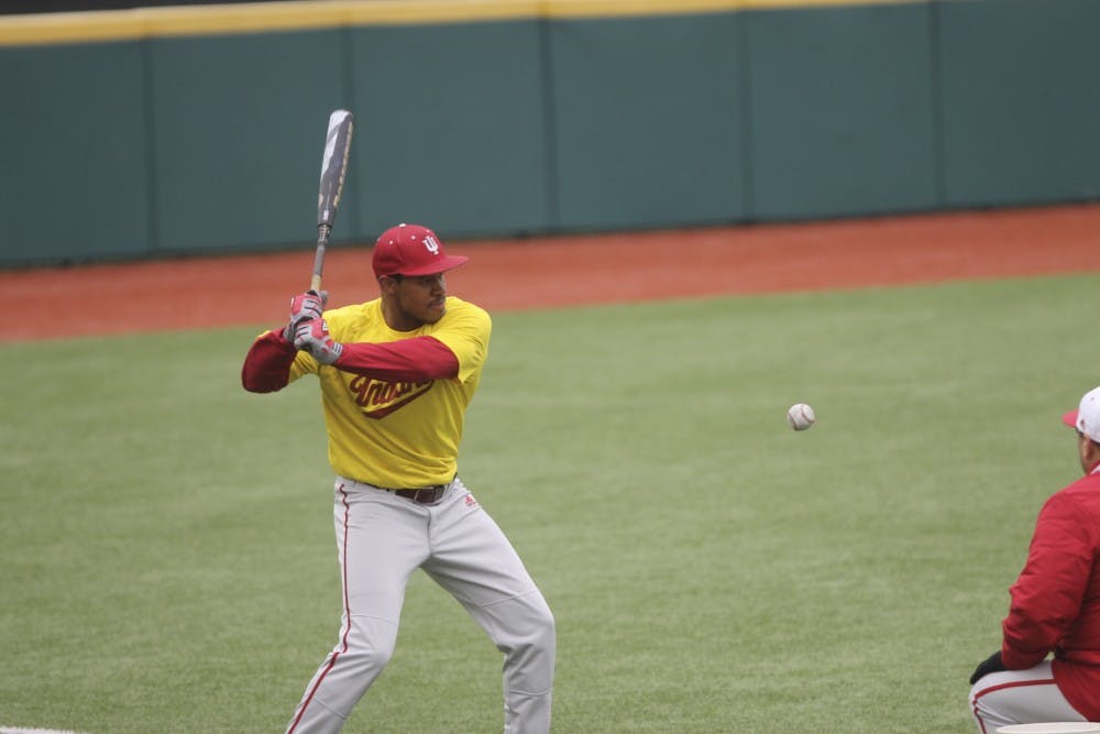 Freshman Larry Crisler practices his batting swing during practice on Wednesday at Bart Kaufman Field.