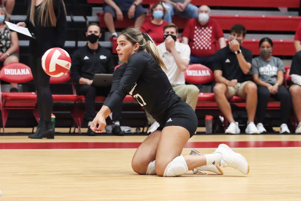 <p>Then-junior defensive specialist Paula Cerame digs the ball Sept. 17, 2021, in Wilkinson Hall. Indiana will face Ohio State on Saturday in Bloomington.</p>