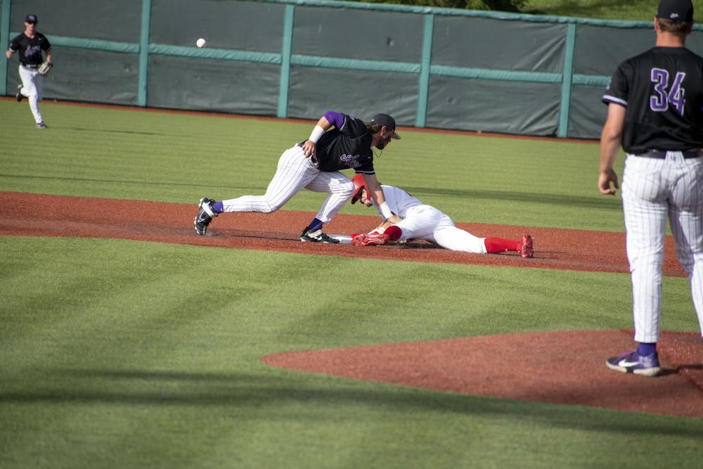 Freshman second baseman Tyler Cerny slides to second base May 16, 2023 against the University of Evansville at Bart Kaufman Field in Bloomington. Indiana lost 9-4 to Iowa in the Big Ten Tournament Thursday in Omaha, Nebraska. 