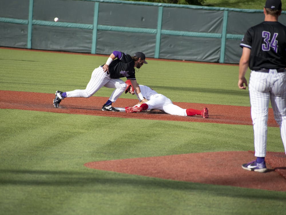 Freshman second baseman Tyler Cerny slides to second base May 16, 2023 against the University of Evansville at Bart Kaufman Field in Bloomington. Indiana lost 9-4 to Iowa in the Big Ten Tournament Thursday in Omaha, Nebraska. 