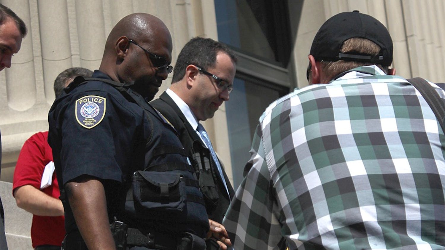 Jared Fogle leaves the federal courthouse in Indianapolis after his hearing on Wednesday. Fogle plead guilty to charges of distributing child pornography and paying for and engaging in sex acts with minors.