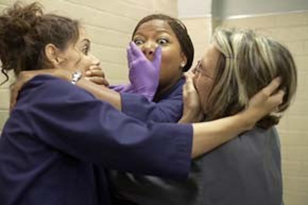 (Left to right.) Katie Holmes, Queen Latifah and Diane Keaton star in Overture Films' MAD MONEY.