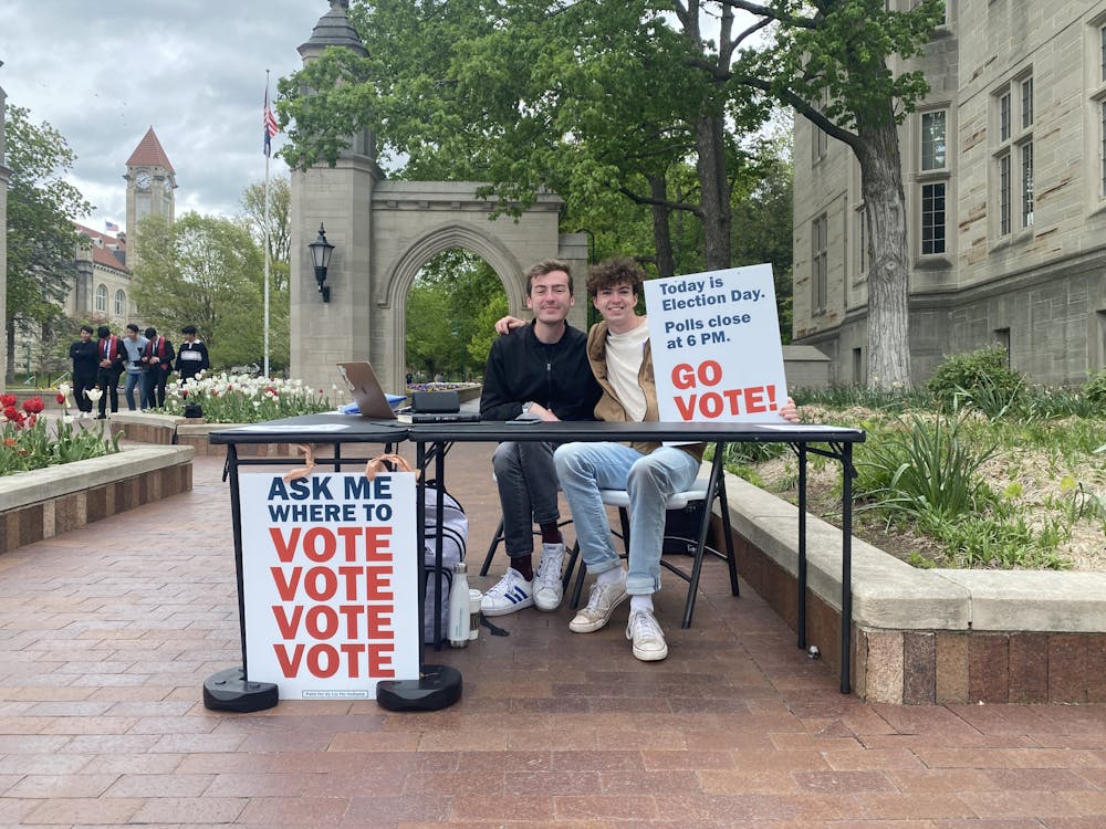 IU students Tim Dwyer (left) and Emmett Nolan (right) table ﻿at the Sample Gates on behalf of the College Democrats at IU for Election Day. Former IU student Sydney Zulich won the Democratic nomination for the Bloomington City Council District 6 race. 