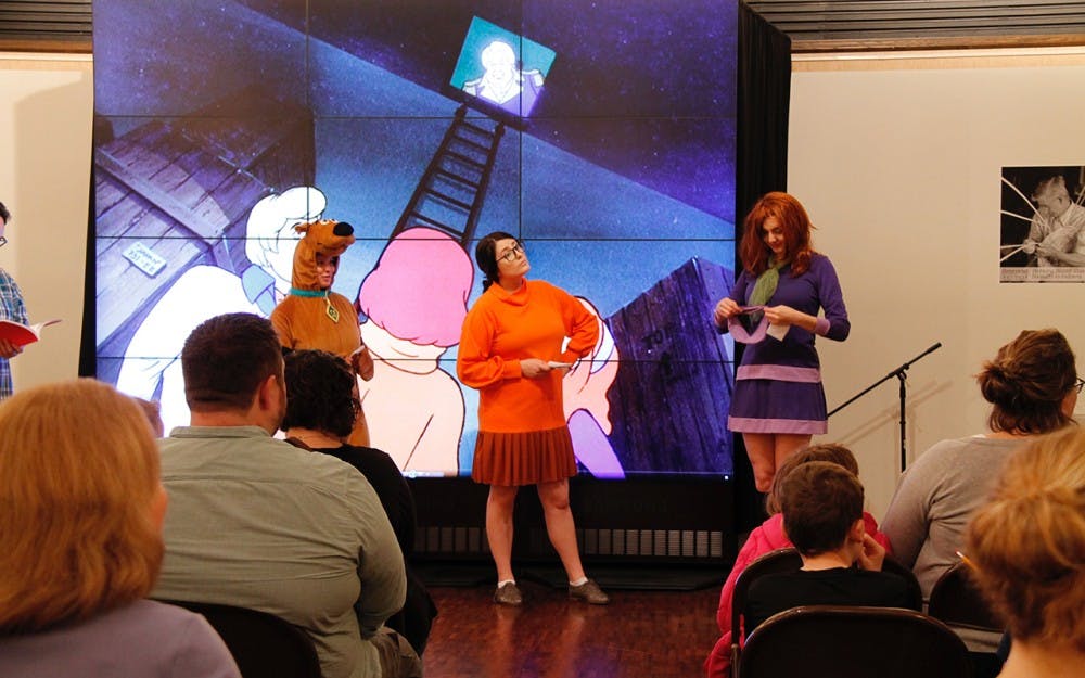 Scooby-Doo, Velma and Daphne, played by student cosplayers Kristen Pimley, Erin Garman and Alexa Lively, led efforts to solve the mystery of the missing butter churn during the "Mystery at the Museum" event Sunday afternoon at Mathers.&nbsp;