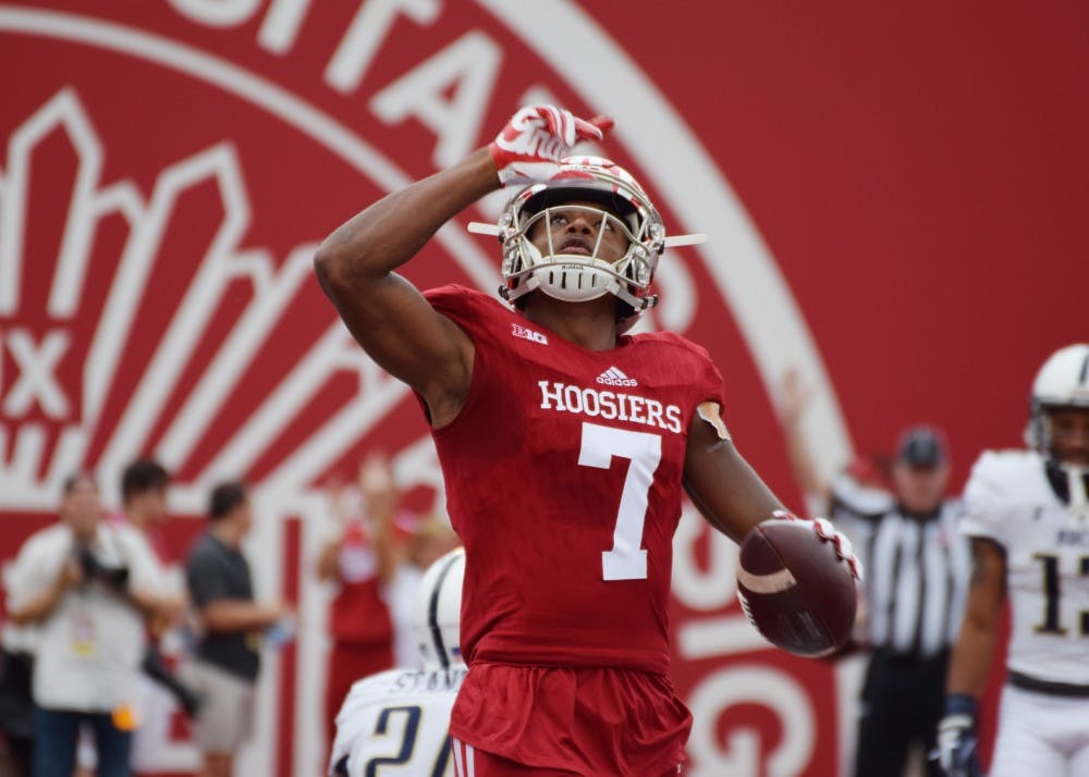 Redshirt freshman wide receiver Taysir Mack salutes the sky after scoring the game's first touchdown for IU against Charleston Southern on Oct. 7. Mack has become a consistent presence at wide receiver for IU this season after injuries to three other wide receivers.&nbsp;